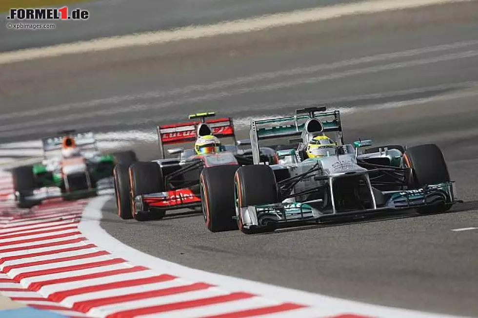 Foto zur News: Nico Rosberg, Sergio Perez