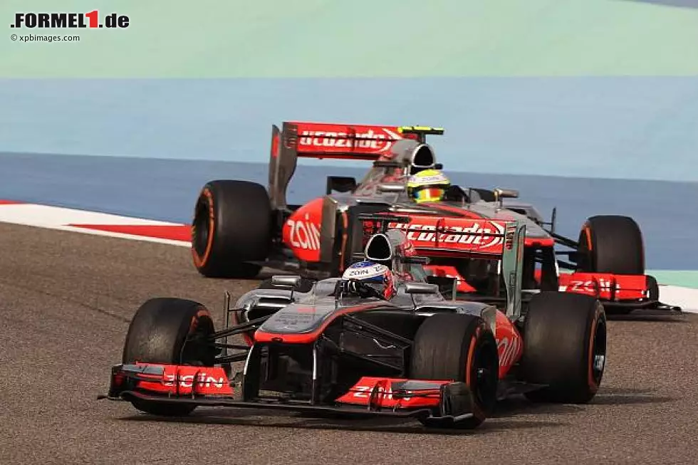 Foto zur News: Jenson Button, Sergio Perez