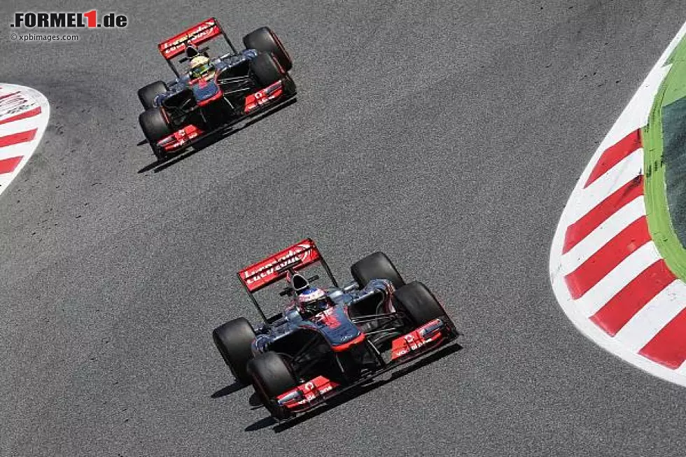 Jenson Button, Sebastian Vettel Foto zur News: Jenson Button, Sebastian Vettel
