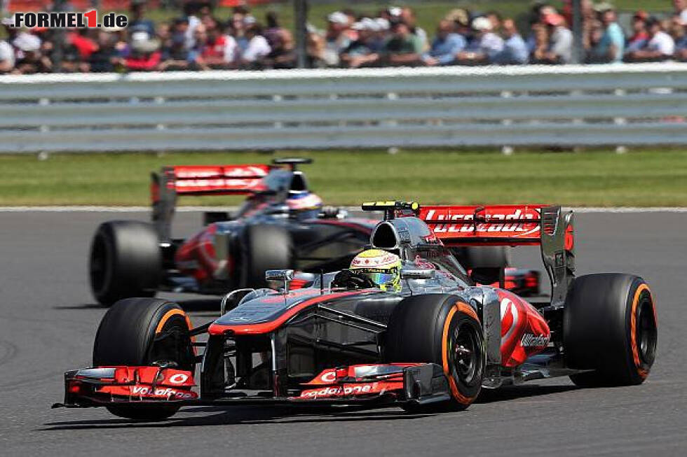 Foto zur News: Sergio Perez, Jenson Button