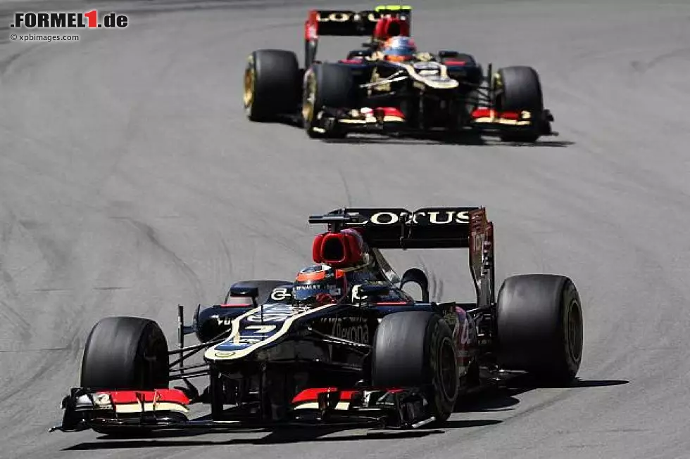 Foto zur News: Romain Grosjean, Kimi Räikkönen