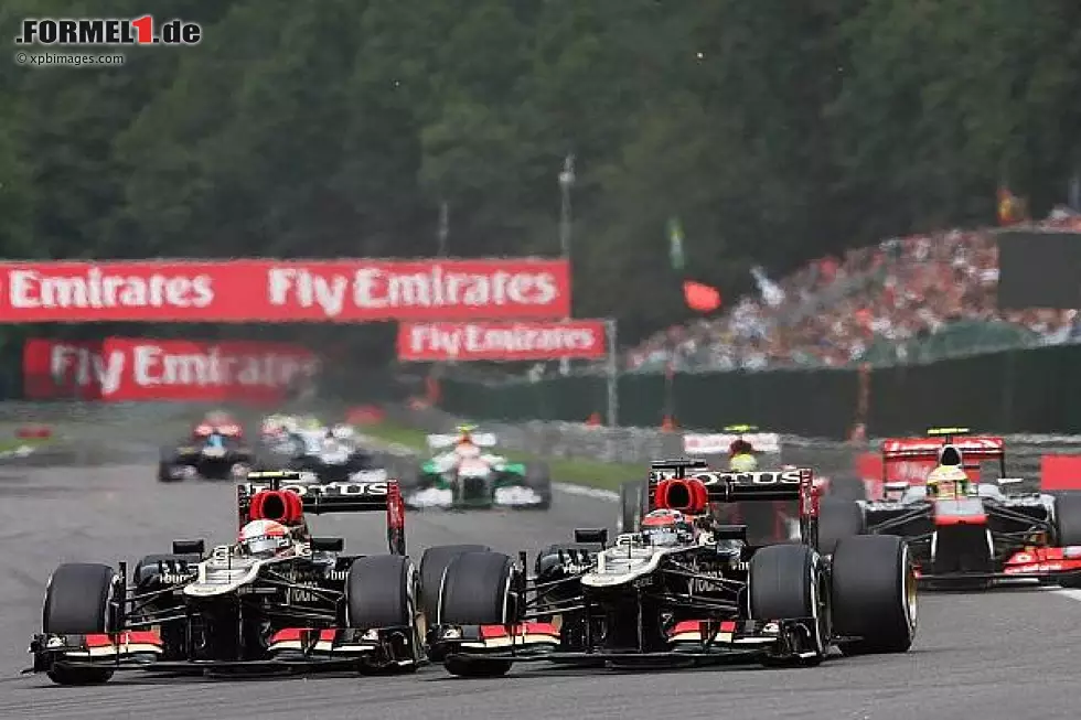 Foto zur News: Romain Grosjean, Kimi Räikkönen