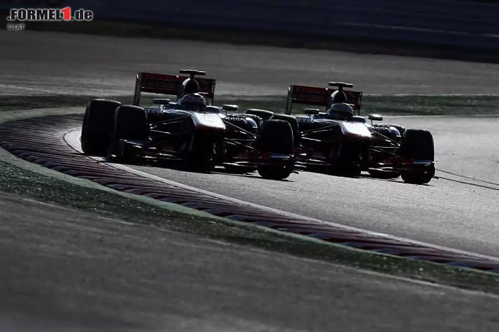Foto zur News: Jenson Button, Sergio Perez