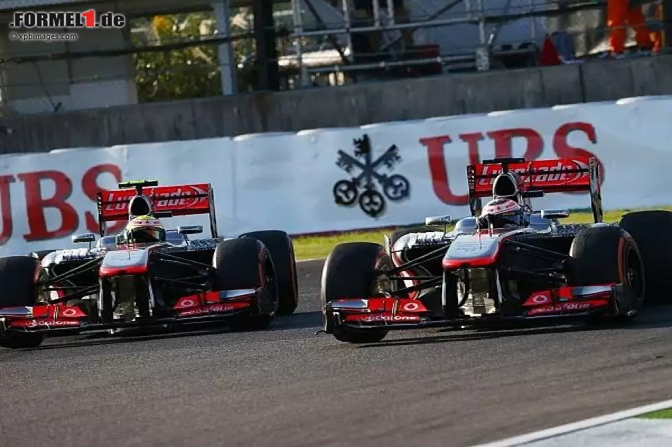 Foto zur News: Sergio Perez, Jenson Button