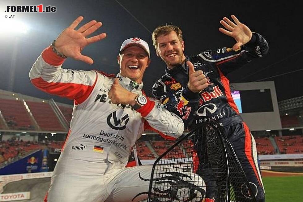 Foto zur News: Michael Schumacher, Sebastian Vettel