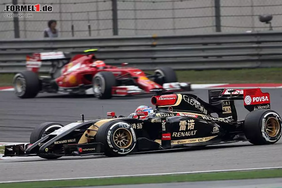 Foto zur News: Romain Grosjean, Kimi Räikkönen