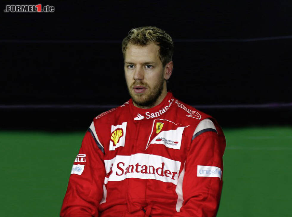 Foto zur News: Sebastian Vettel im Ferrari-Overall (Fotomontage)