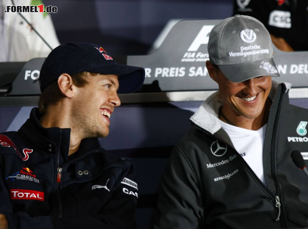 Foto zur News: Sebastian Vettel, Michael Schumacher