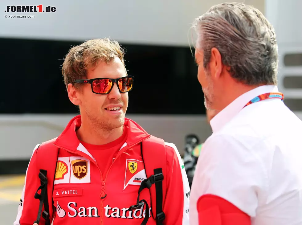Foto zur News: Sebastian Vettel, Maurizio Arrivabene
