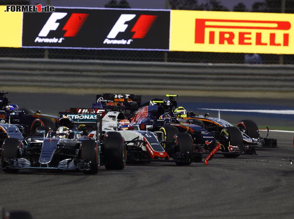 Foto zur News: Romain Grosjean, Carlos Sainz, Sergio Perez