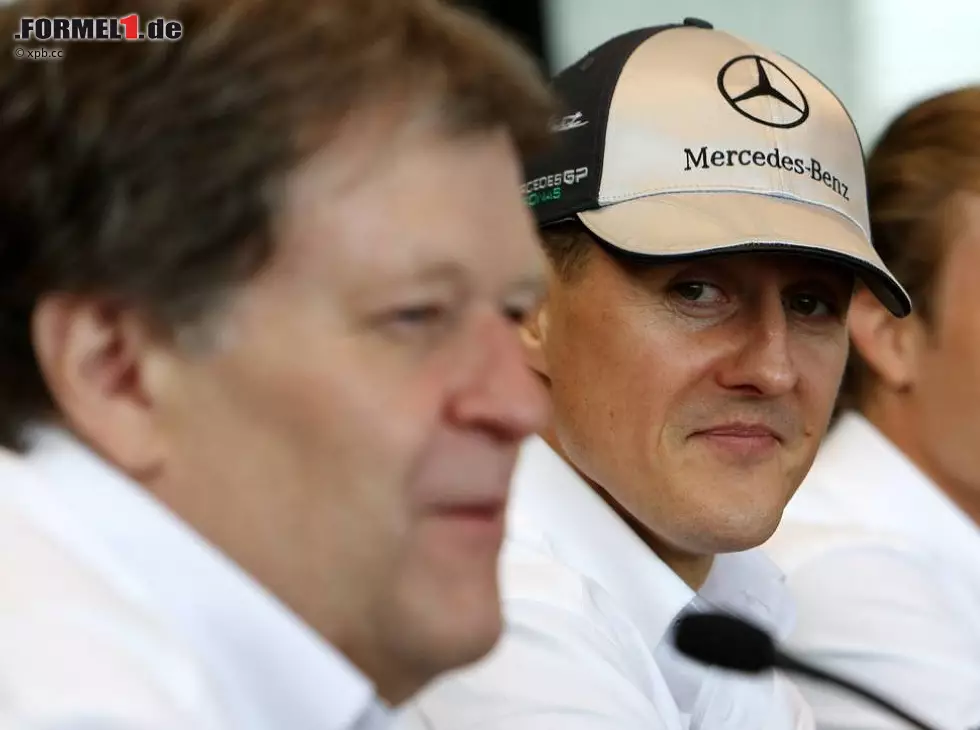Foto zur News: Michael Schumacher, Nico Rosberg, Norbert Haug