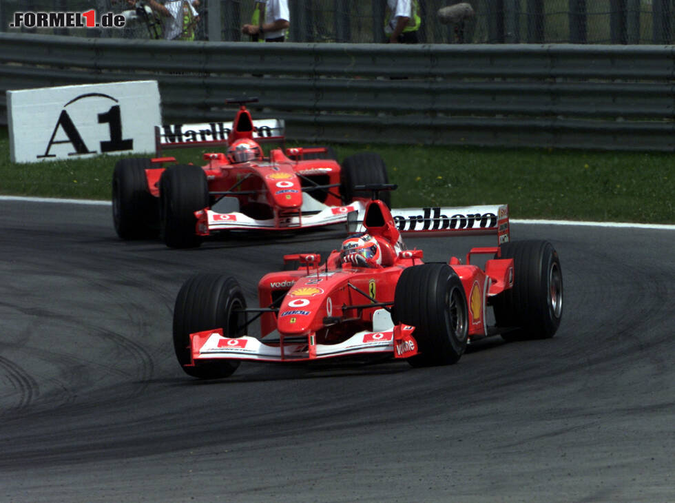 Foto zur News: Rubens Barrichello, Michael Schumacher
