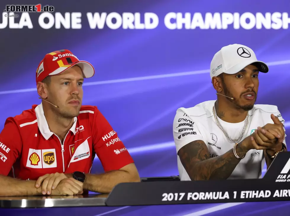 Foto zur News: Sebastian Vettel, Lewis Hamilton
