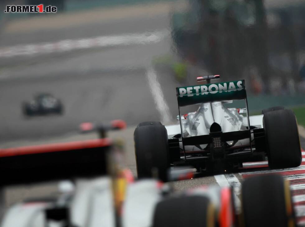 Foto zur News: Nico Rosberg, Michael Schumacher, Jenson Button