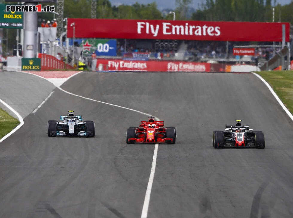 Foto zur News: Kevin Magnussen, Sebastian Vettel, Valtteri Bottas