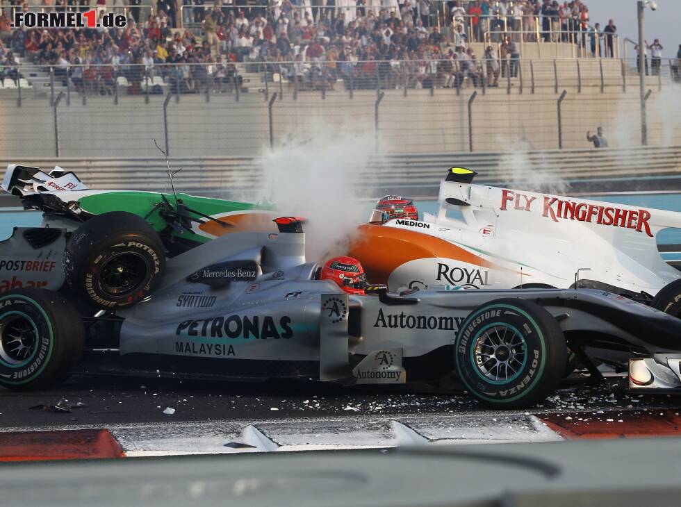 Foto zur News: Vitantonio Liuzzi, Michael Schumacher
