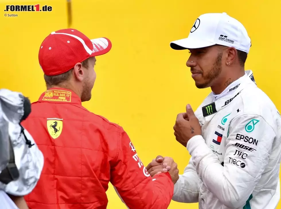Foto zur News: Sebastian Vettel, Lewis Hamilton