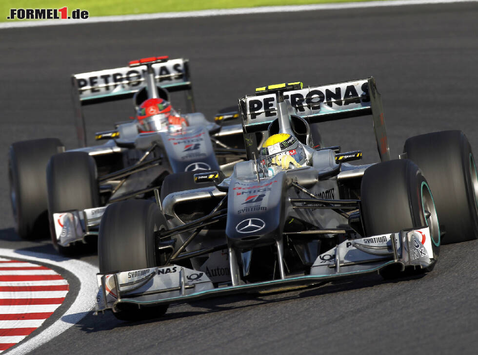 Foto zur News: Michael Schumacher, Nico Rosberg