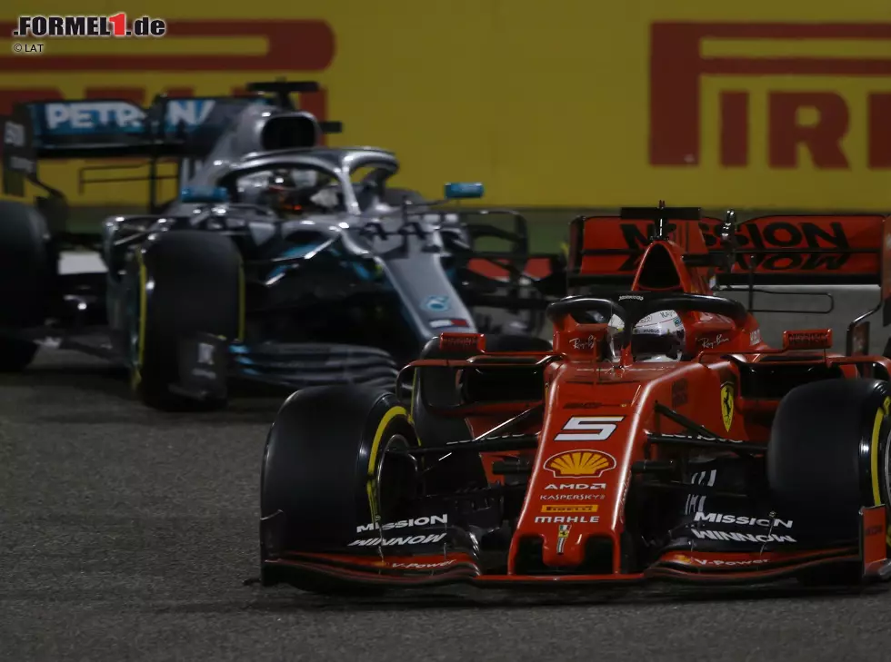 Foto zur News: Sebastian Vettel, Lewis Hamilton