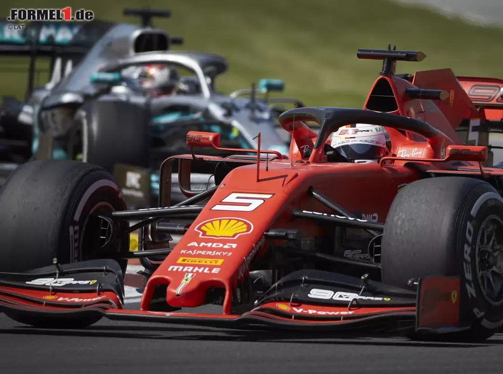 Foto zur News: Sebastian Vettel, Lewis Hamilton