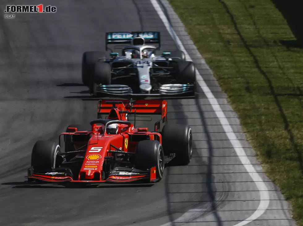 Foto zur News: Sebastian Vettel, Lewis Hamilton