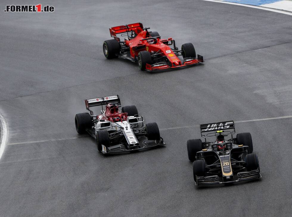 Foto zur News: Kevin Magnussen, Kimi Räikkönen, Sebastian Vettel