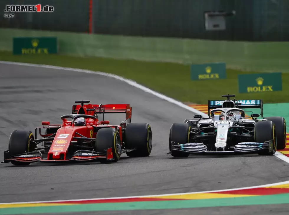 Foto zur News: Sebastian Vettel, Lewis Hamilton