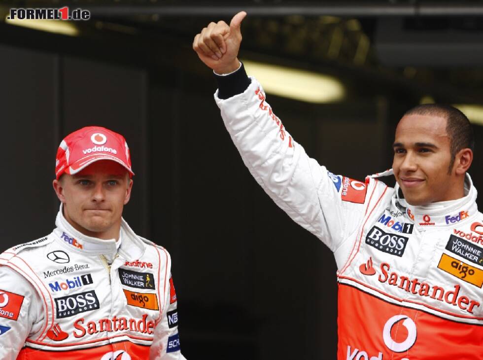 Foto zur News: Heikki Kovalainen, Lewis Hamilton