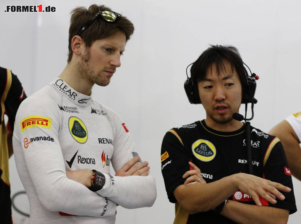 Foto zur News: Romain Grosjean und sein Renningenieur Ayao Komatsu bei Lotus