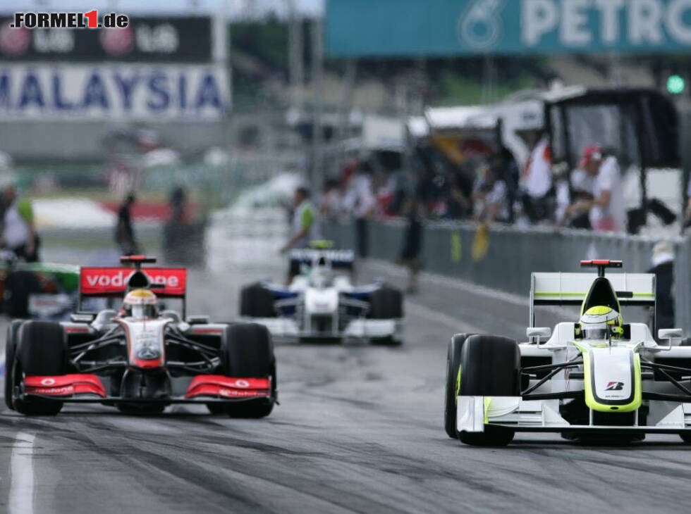 Foto zur News: Jenson Button, Lewis Hamilton