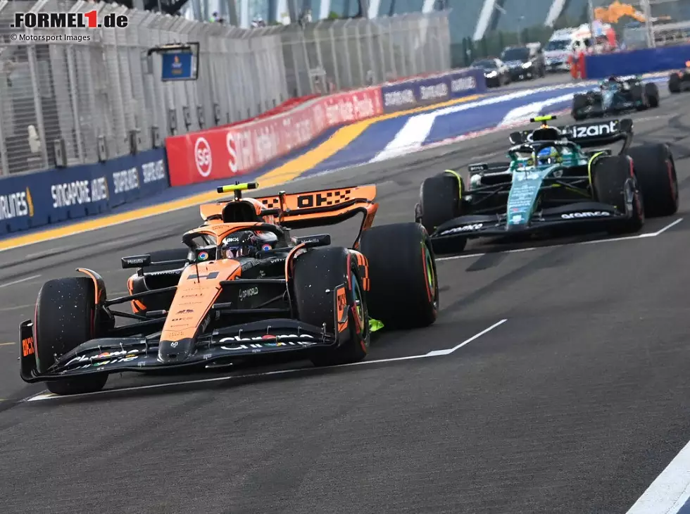 Foto zur News: Lando Norris, Fernando Alonso