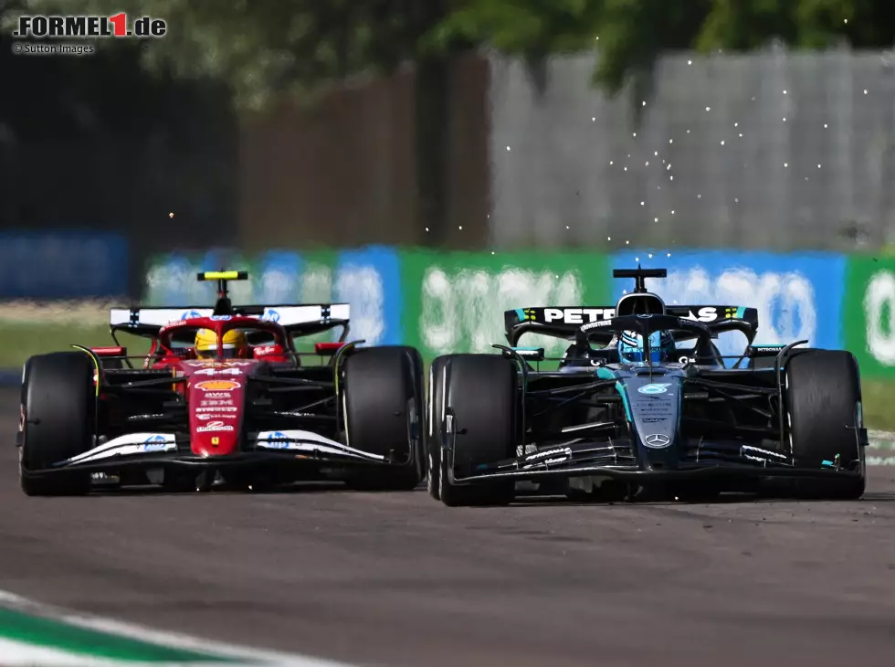 Foto zur News: George Russell (Mercedes) und Lewis Hamilton (Ferrari) beim Formel-1-Rennen in Imola 2025