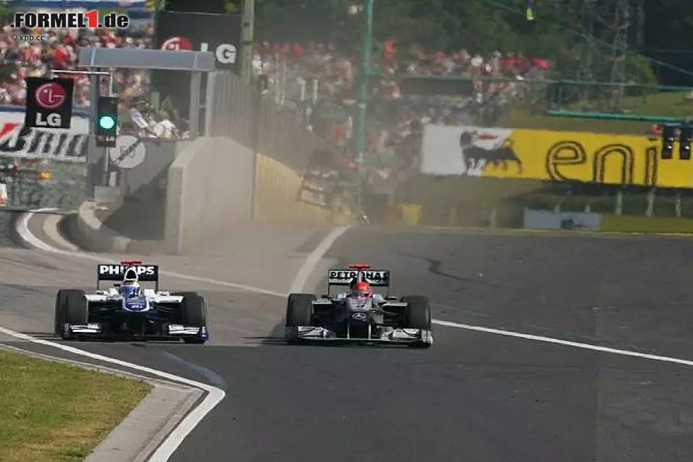 Foto zur News: Michael Schumacher, Rubens Barrichello