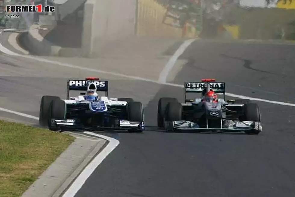 Foto zur News: Michael Schumacher, Rubens Barrichello