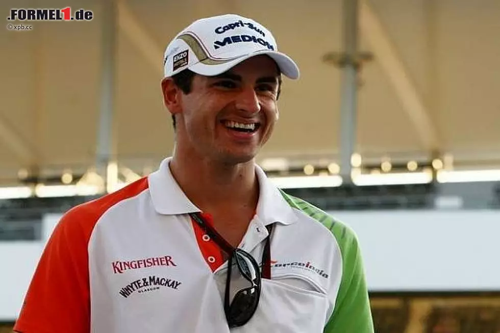 Foto zur News: Nico Rosberg, Adrian Sutil