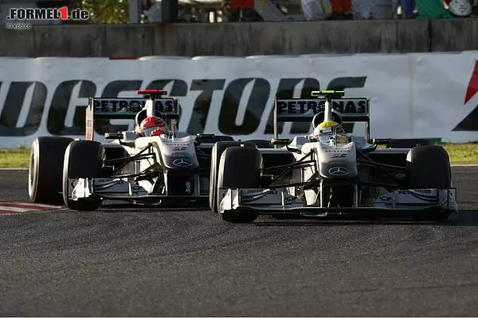 Foto zur News: Michael Schumacher, Nico Rosberg