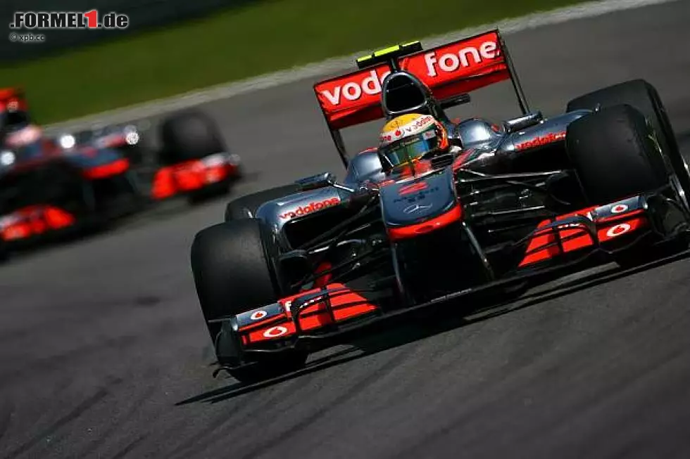 Foto zur News: Lewis Hamilton, Jenson Button