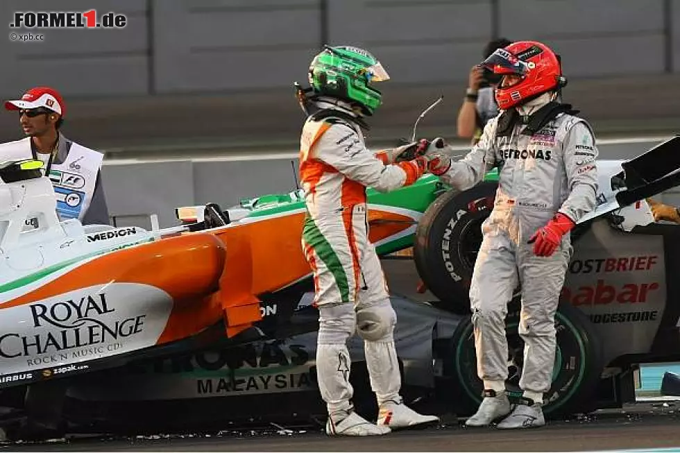 Foto zur News: Vitantonio Liuzzi und Michael Schumacher