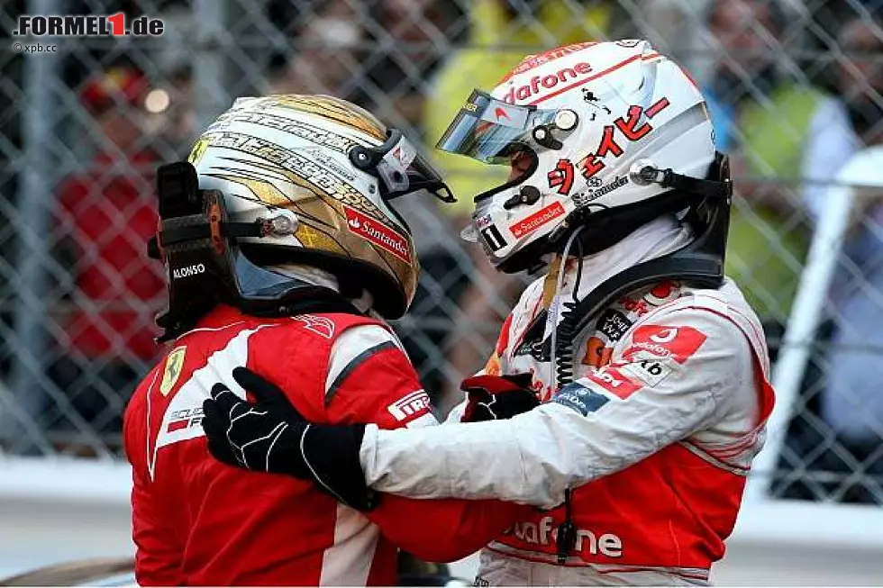 Foto zur News: Fernando Alonso und Jenson Button