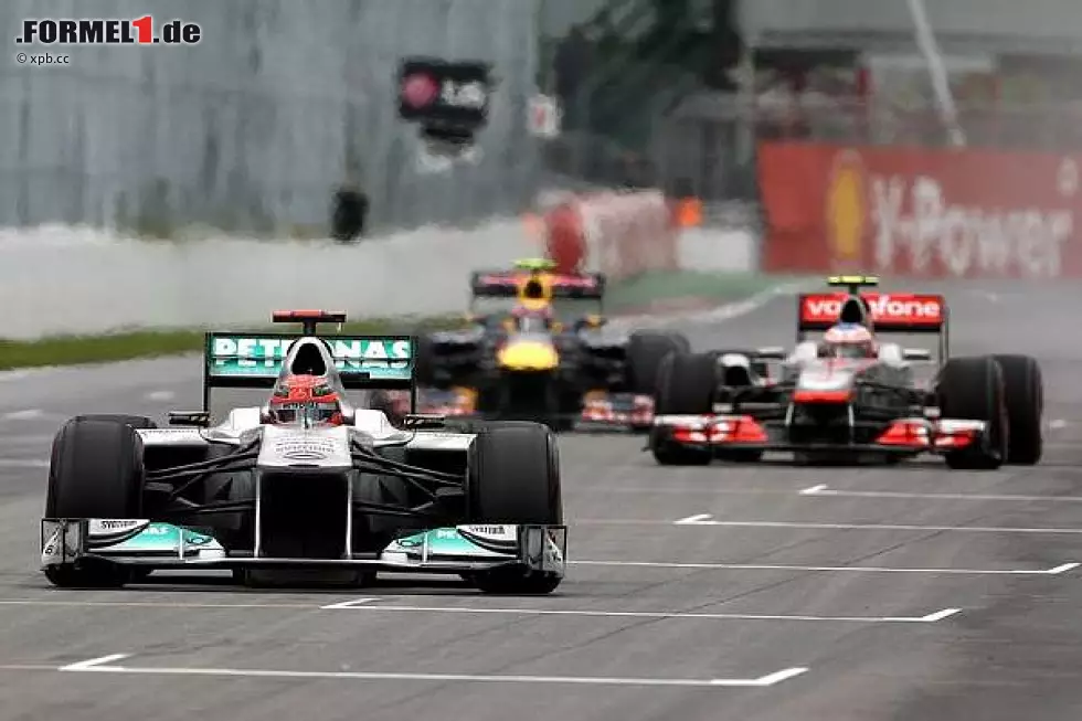 Foto zur News: Michael Schumacher, Jenson Button, Mark Webber