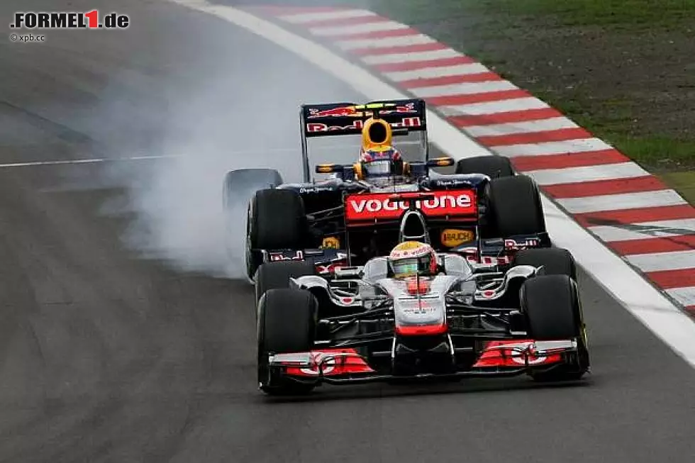 Foto zur News: Mark Webber, Lewis Hamilton