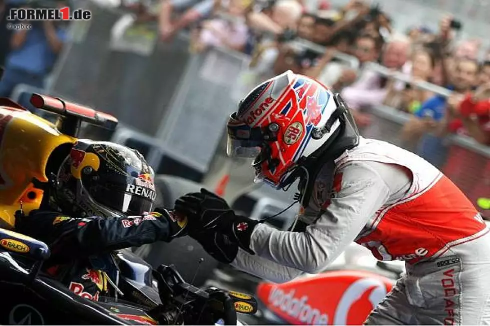 Foto zur News: Jenson Button, Sebastian Vettel